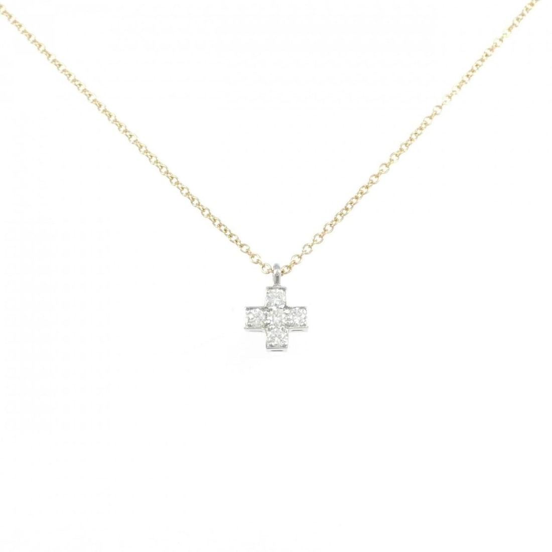 Tiffany Cruciform Necklace: --- Catalog ---Category: SizeWidth: 1.1mm / 0.04''Weight: 2.2g / 0.07oz.Pendant Size: 9.6mm x 6.7mm / 0.37'' x 0.26''Neck Circumference: 40 cm / 15.74''Category: DesignStone: DiamondGender:
