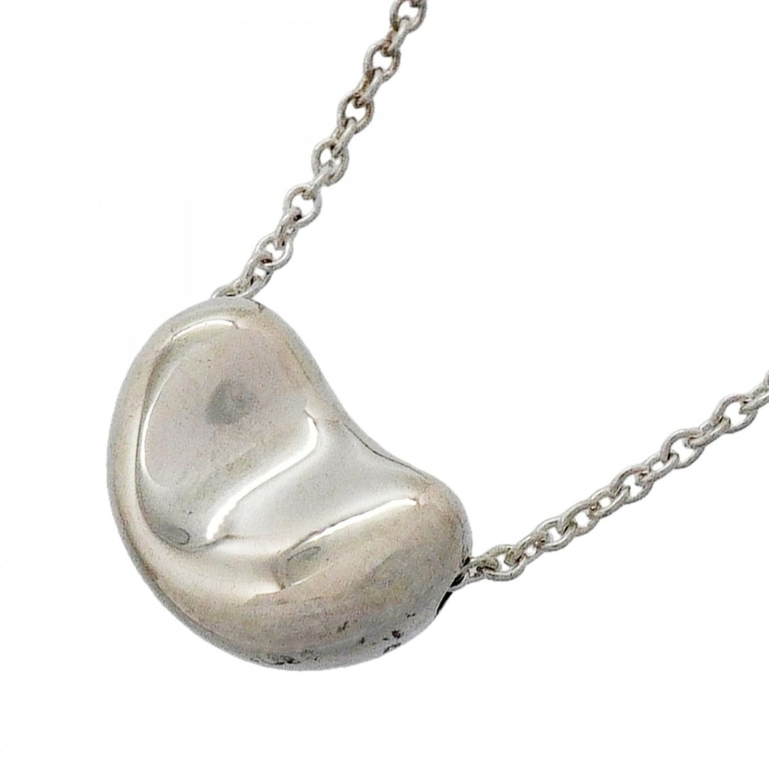 Tiffany & Co. Bean Necklace, Sterling Silver 925, Women's: --- Catalog ---Category: SizePendant Size: 7.5mm x 11mm / 0.29'' x 0.43''Neck Circumference: 42 cm / 16.53''Category: DesignGender: WomenMaterial: Silver 925Necklace Type: NecklaceCategory: GeneralBra