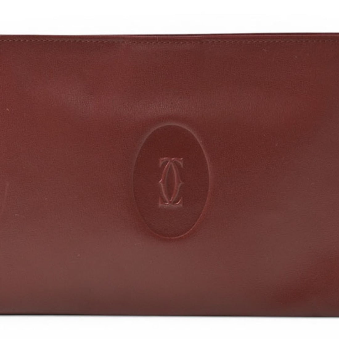 Cartier pouch, Must de mini clutch bag Bordeaux leather: --- Catalog ---Category: SizeSize (HxWxD): 12.5cm x 19cm x 1cm / 4.92'' x 7.48'' x 0.39''Category: DesignType: PouchColor: BordeauxGender: Men,WomenMaterial: Leather Category: GeneralBrand: CartierCou