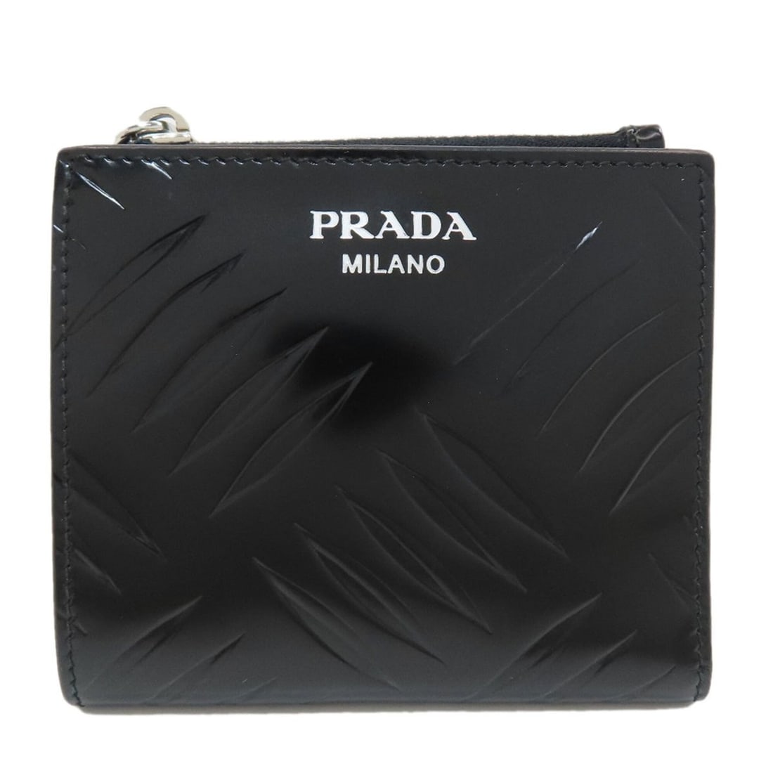 Prada Embossed Bi-fold Leather Wallet for Women PRADA: --- Catalog ---Category: SizeSize (HxWxD): 9.5cm x 10cm x 1cm / 3.74'' x 3.93'' x 0.39''Category: DesignType: Wallet (bi-fold)Color: BlackGender: WomenMaterial: Leather Category: GeneralBrand: Prada--