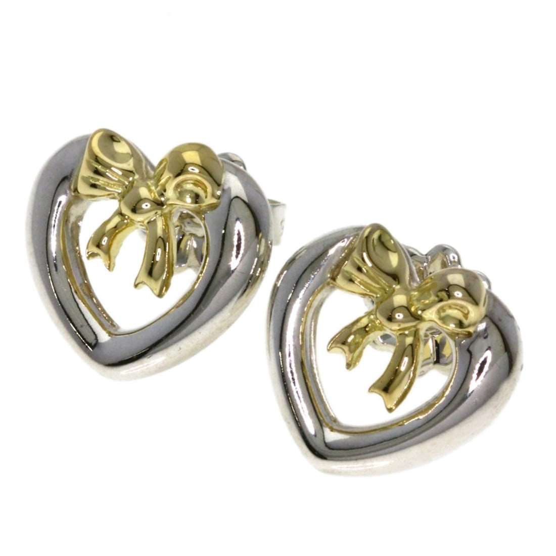 Tiffany & Co. Heart with Bow Earrings, Silver/18K Yellow Gold, Women's.: --- Catalog ---Category: SizeSize (HxWxD): 10.50mm x 11.20mm / 0.41'' x 0.44''Category: DesignType: Stud earringsGender: WomenMaterial: Silver, Yellow gold (18K)Category: GeneralBrand: Tiffany--- Item