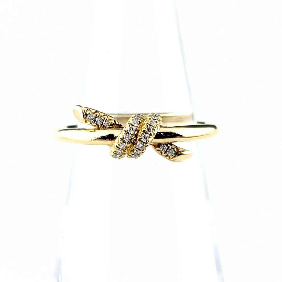 Tiffany & Co. Knot Ring, Yellow Gold (YG), with small diamonds, 750 diamond ring, for women.: --- Catalog ---Category: SizeJP Size: 12US Size: 6.5Category: DesignType: Band ringStone: DiamondGender: WomenMaterial: Yellow gold (18K)Category: GeneralBrand: Tiffany--- Item List ---Section: Condit