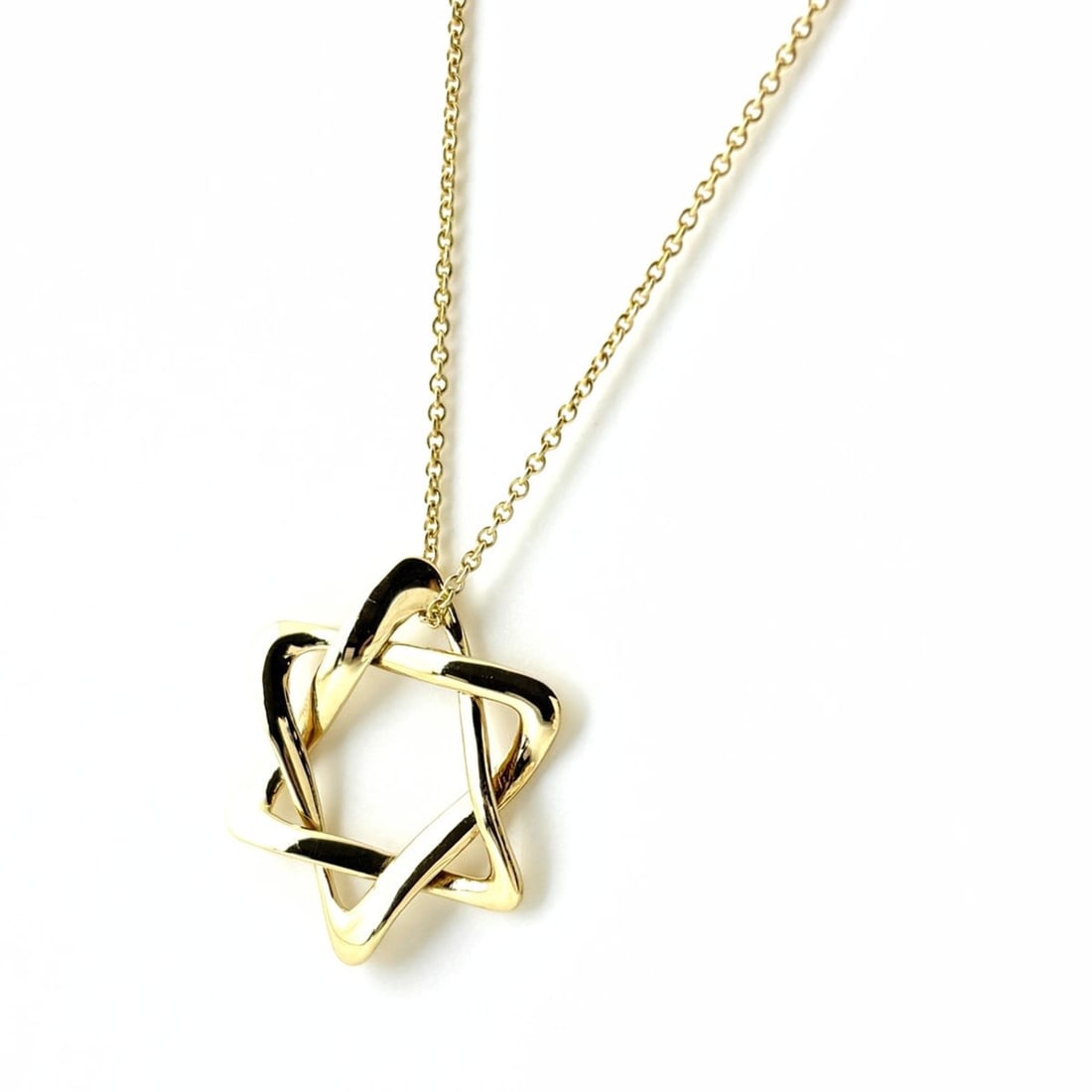 Tiffany & Co. Star of David Necklace, Yellow Gold (750), Women's Necklace: --- Catalog ---Category: SizePendant Size: 21.2mm x 21.7mm / 0.83'' x 0.85''Neck Circumference: 61 cm / 24.01''Category: DesignGender: WomenMaterial: Yellow gold (18K)Necklace Type: NecklaceCategory: 
