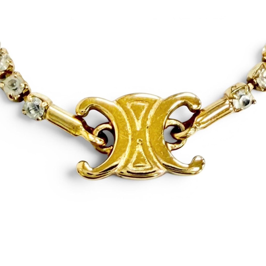 CELINE Triomphe Sparkle Rhinestone Necklace, Gold, Made in Italy, Women's, Comes with Box and Dust: --- Catalog ---Category: SizePendant Size: 6mm x 10mm / 0.23'' x 0.39''Neck Circumference: 36 cm - 42 cm / 14.17'' - 16.53''Category: DesignColor: GoldGender: WomenNecklace Type: NecklaceCategory: Gen