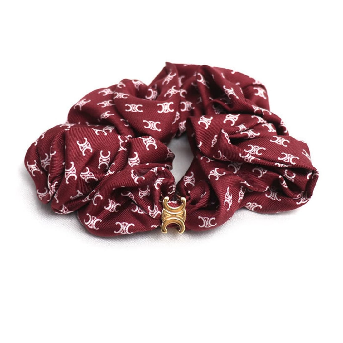 CELINE Silk Brass Mini Triomphe Hair Accessory 461DK2SIB.28AI Scrunchie for Women: --- Catalog ---Category: SizeSize (LxW): 5cm / 1.96''Category: DesignType: ScrunchieColor: Burgundy, IvoryGender: WomenMaterial: Brass, SilkCategory: GeneralMPN: 461DK2SIB.28AIBrand: CelineCountry of 