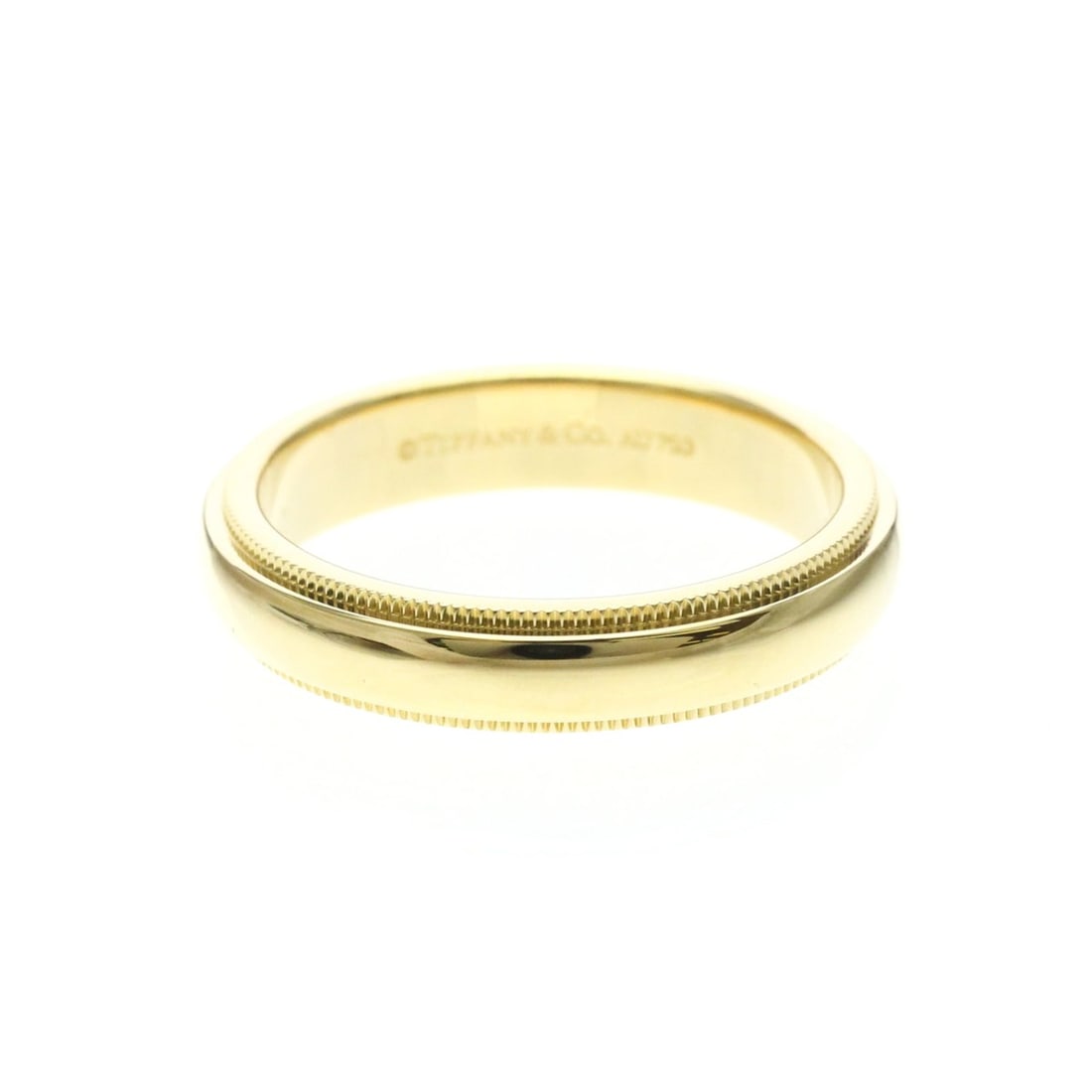 Tiffany Milgrain Ring Yellow Gold (18K) Fashion No Stone Band Ring Gold: --- Catalog ---Category: SizeWidth: 4.2mm / 0.17''Weight: 6.7g / 0.23oz.JP Size: 14.5US Size: 7Category: DesignType: Band ringColor: GoldMetal: GoldStone: No StoneStyle: FashionGender: Men,WomenMateri