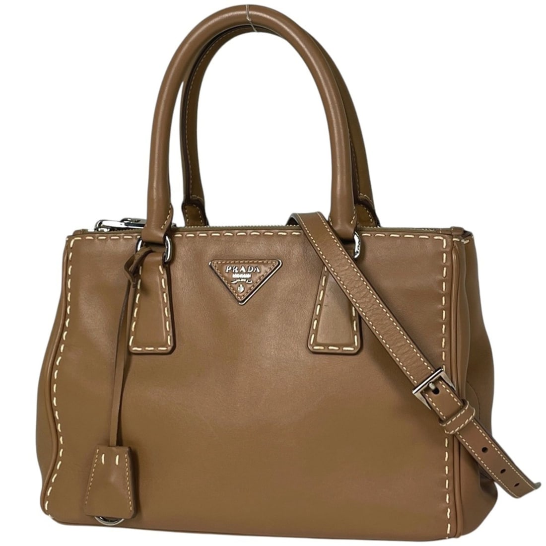 Prada Galleria Handbag, 2-Way, Stitched Leather, Brown, Women's: --- Catalog ---Category: SizeSize (HxWxD): 19cm x 28cm x 12cm / 7.48'' x 11.02'' x 4.72''Category: DesignType: HandbagColor: BrownGender: WomenMaterial: Leather Category: GeneralBrand: Prada--- Item L