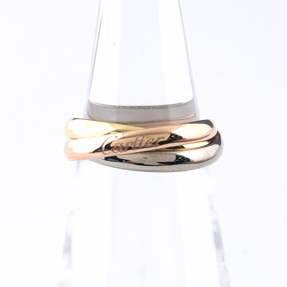 Cartier Trinity Ring, available in yellow gold (YG), pink (PG), and white (WG). Three-color design,