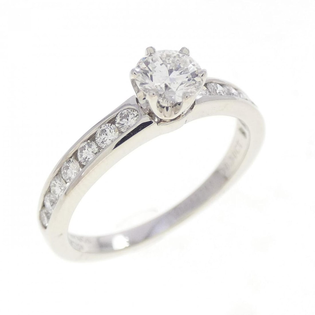 Tiffany & Co. Solitaire Channel Setting Ring 0.30 CT: --- Catalog ---Category: SizeJP Size: 9US Size: 5Category: DesignType: Band ringGender: WomenMaterial: Platinum 950Category: GeneralBrand: Tiffany--- Item List ---Section: ConditionRanking: Rank SA Us