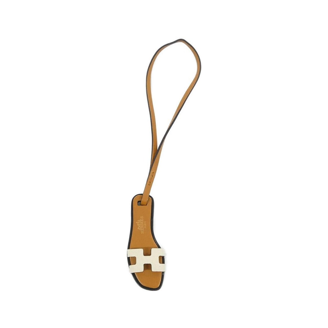 Hermes Oran Nano Accessory Bag Charm 080148CA: --- Catalog ---Category: SizeSize (HxWxD): 73.00mm x 27.00mm / 2.87'' x 1.06''Category: DesignType: Handbag charmColor: Brown, Natural sableGender: WomenMaterial: Epsom leatherCategory: GeneralMPN: