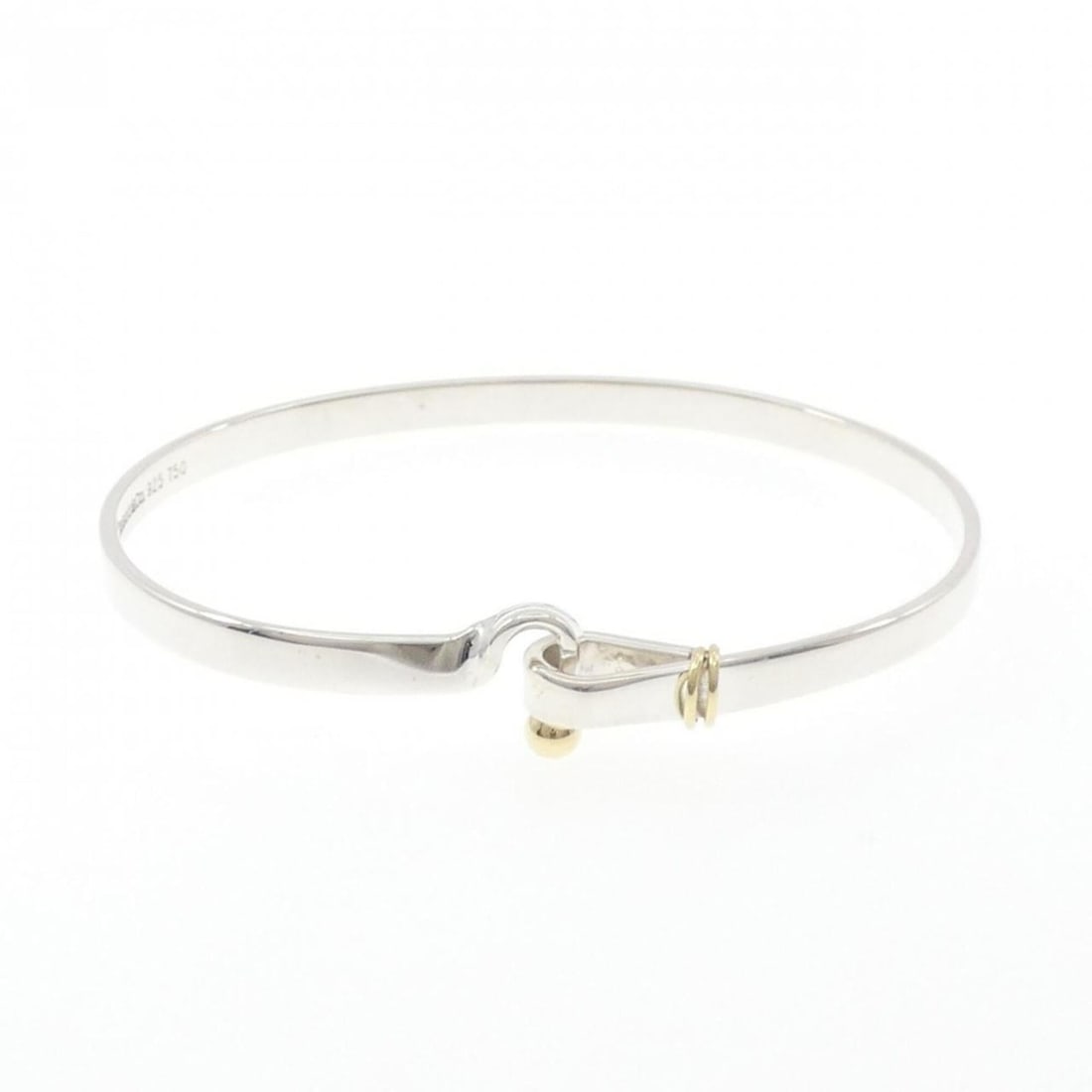 Tiffany Hook & Eye Bangle: --- Catalog ---Category: SizeLength: 18cm / 7.08''Category: DesignType: BangleGender: WomenMaterial: Silver 925, Yellow gold (18K)Category: GeneralBrand: Tiffany--- Item List ---Section: