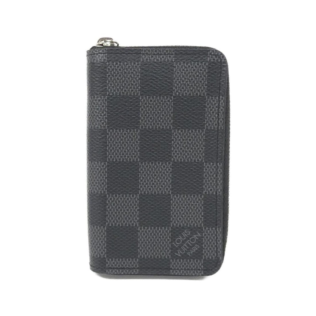 Louis Vuitton Damier Graphite Zippy Coin Purse N63076 Wallet/Coin Case: --- Catalog ---Category: SizeSize (HxWxD): 7cm x 12cm x 2cm / 2.75'' x 4.72'' x 0.78''Category: DesignType: Coin purse/coin caseColor: GraphiteGender: MenMaterial: Coated canvas Category: GeneralMPN: 