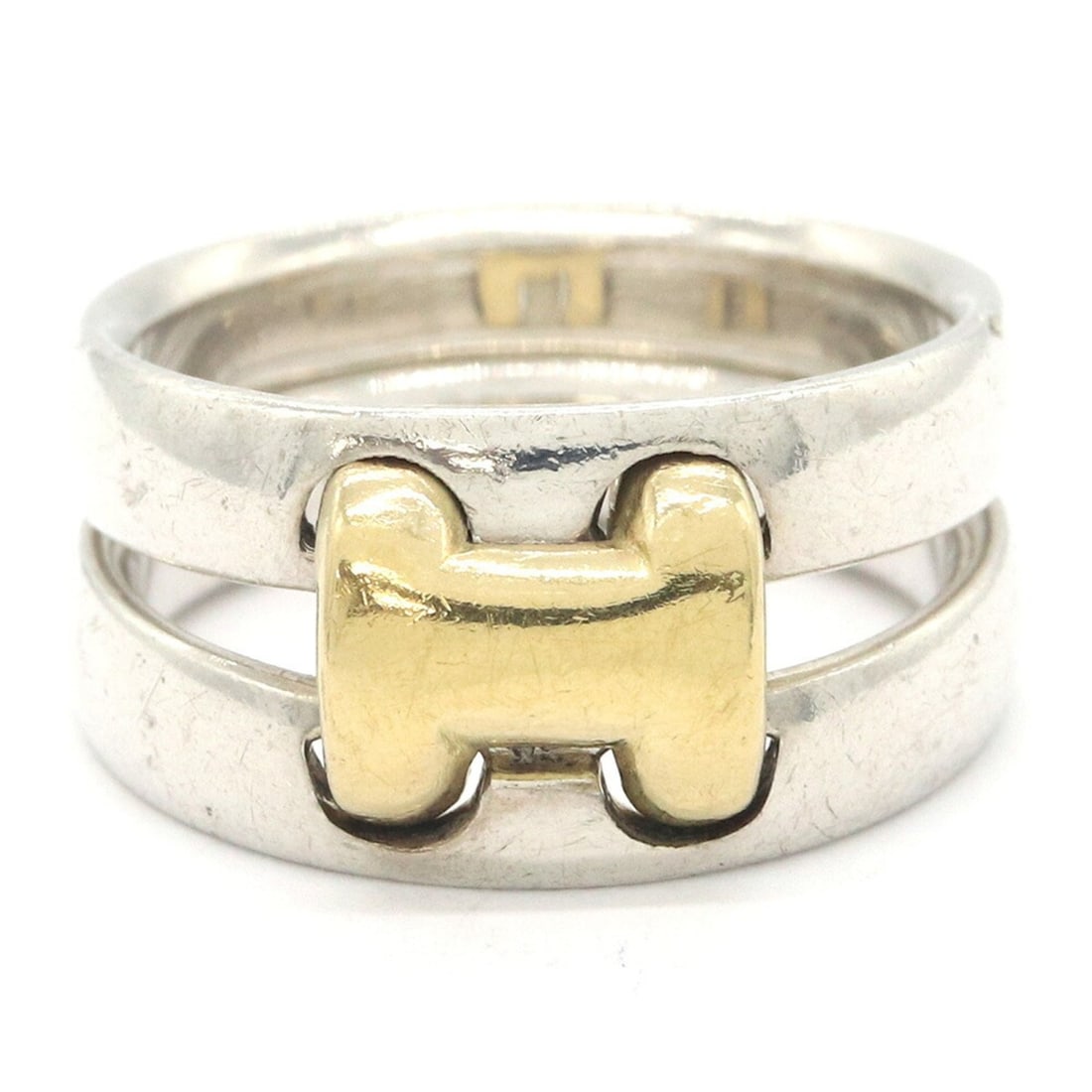 Hermes Olympe ring, sterling silver and yellow gold, size 52, hallmarked, combination design,: --- Catalog ---Category: SizeJP Size: 11US Size: 6Category: DesignColor: Black, YellowGender: WomenMaterial: Sterling silver 925, Yellow goldCategory: GeneralBrand: Hermes--- Item List ---Section: Con