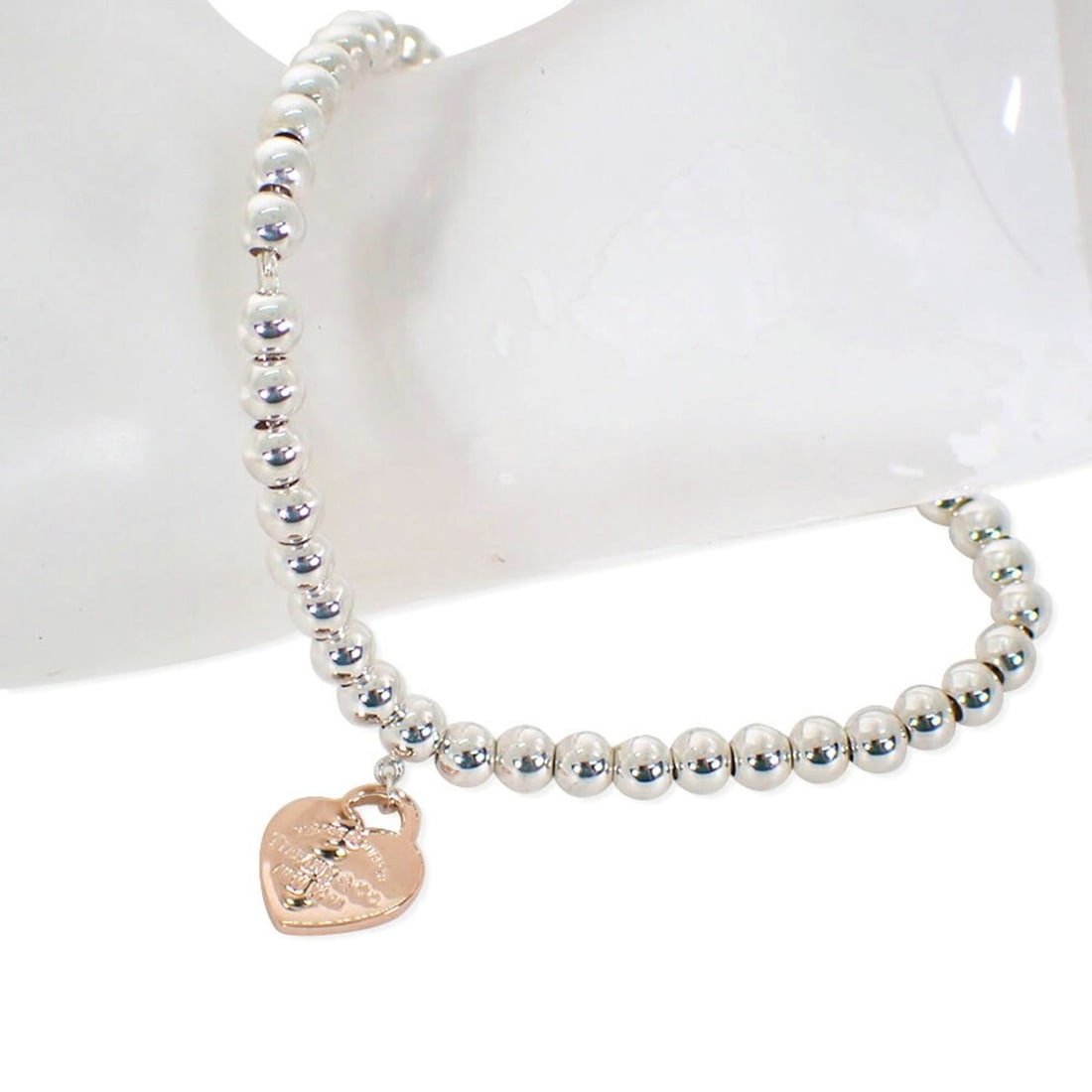 TIFFANY & Co. 925 Metal Return to Heart Bracelet: --- Catalog ---Category: SizeLength: 17.5cm / 6.88''Category: DesignType: Charm braceletGender: WomenMaterial: Metal, Sterling silver 925Category: GeneralBrand: Tiffany--- Item List ---Section: