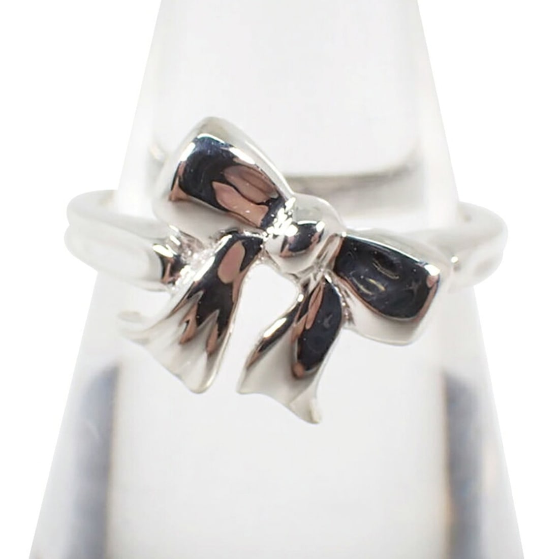 TIFFANY & Co. 925 Ribbon Ring, Size 10.5: --- Catalog ---Category: SizeUS Size: 5.5Brand Size: 50Category: DesignType: Band ringGender: WomenMaterial: Sterling silver 925Category: GeneralBrand: Tiffany--- Item List ---Section: