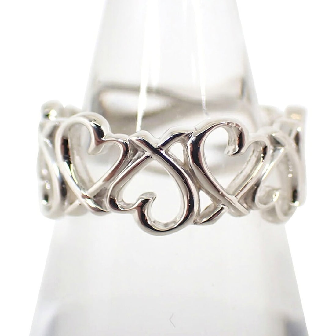 TIFFANY & Co. 925 Full Eternity Loving Heart Ring, Size 9: --- Catalog ---Category: SizeUS Size: 5Brand Size: 49Category: DesignType: Band ringGender: WomenMaterial: Sterling silver 925Category: GeneralBrand: Tiffany--- Item List ---Section: ConditionRanking: