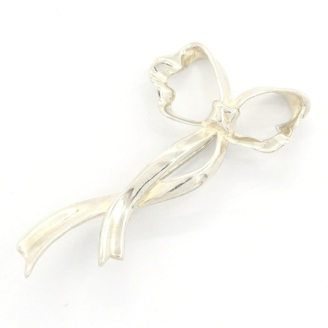 Tiffany & Co. Ribbon Brooch, Sterling Silver 925, Vintage, Women's, Bow Knot: --- Catalog ---Category: SizeCharm Size: 2.6cm x 5.5cm / 1.02'' x 2.17''Category: DesignType: BroochColor: SilverGender: WomenMaterial: Sterling silver 925Category: GeneralBrand: Tiffany--- Item List 