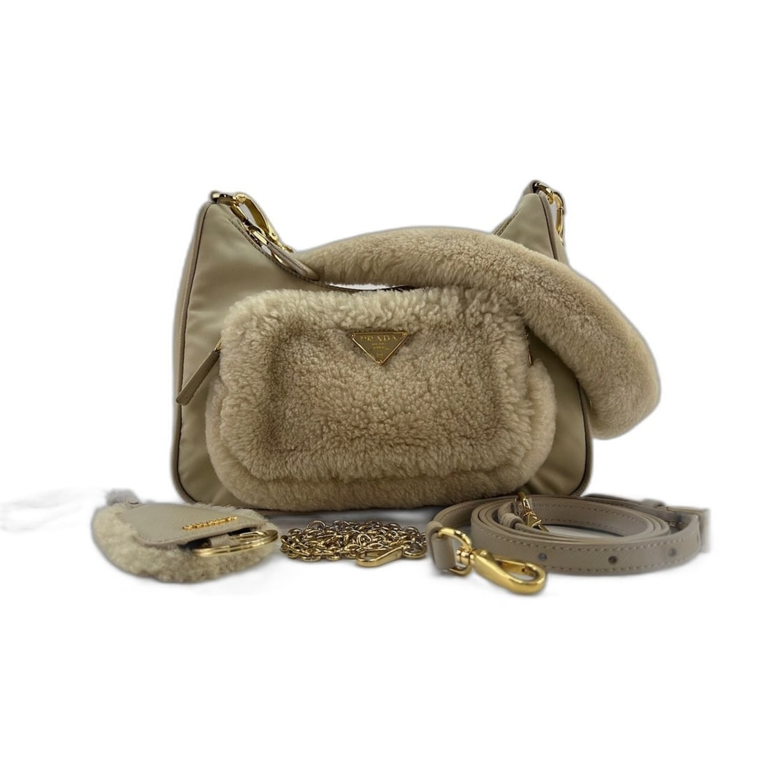 Prada shoulder bag, beige: --- Catalog ---Category: SizeSize (HxWxD): 17cm x 22cm x 6cm / 6.69'' x 8.66'' x 2.36''Strap Length: 51cm - 108cm / 20.07'' - 42.51''Category: DesignType: Shoulder bagColor: BeigeGender: WomenCategory