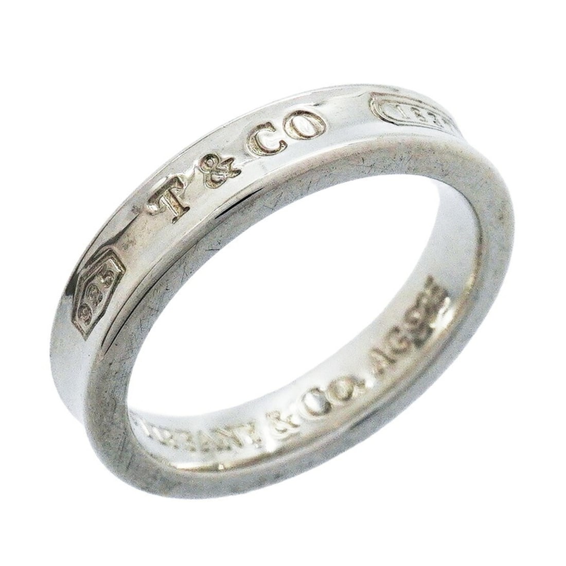Tiffany & Co. Narrow Ring, Sterling Silver 925, Size 9, Women's: --- Catalog ---Category: SizeJP Size: 9US Size: 5Category: DesignType: Band ringGender: WomenMaterial: Silver 925Category: GeneralBrand: Tiffany--- Item List ---Section: ConditionRanking: Rank AB Used