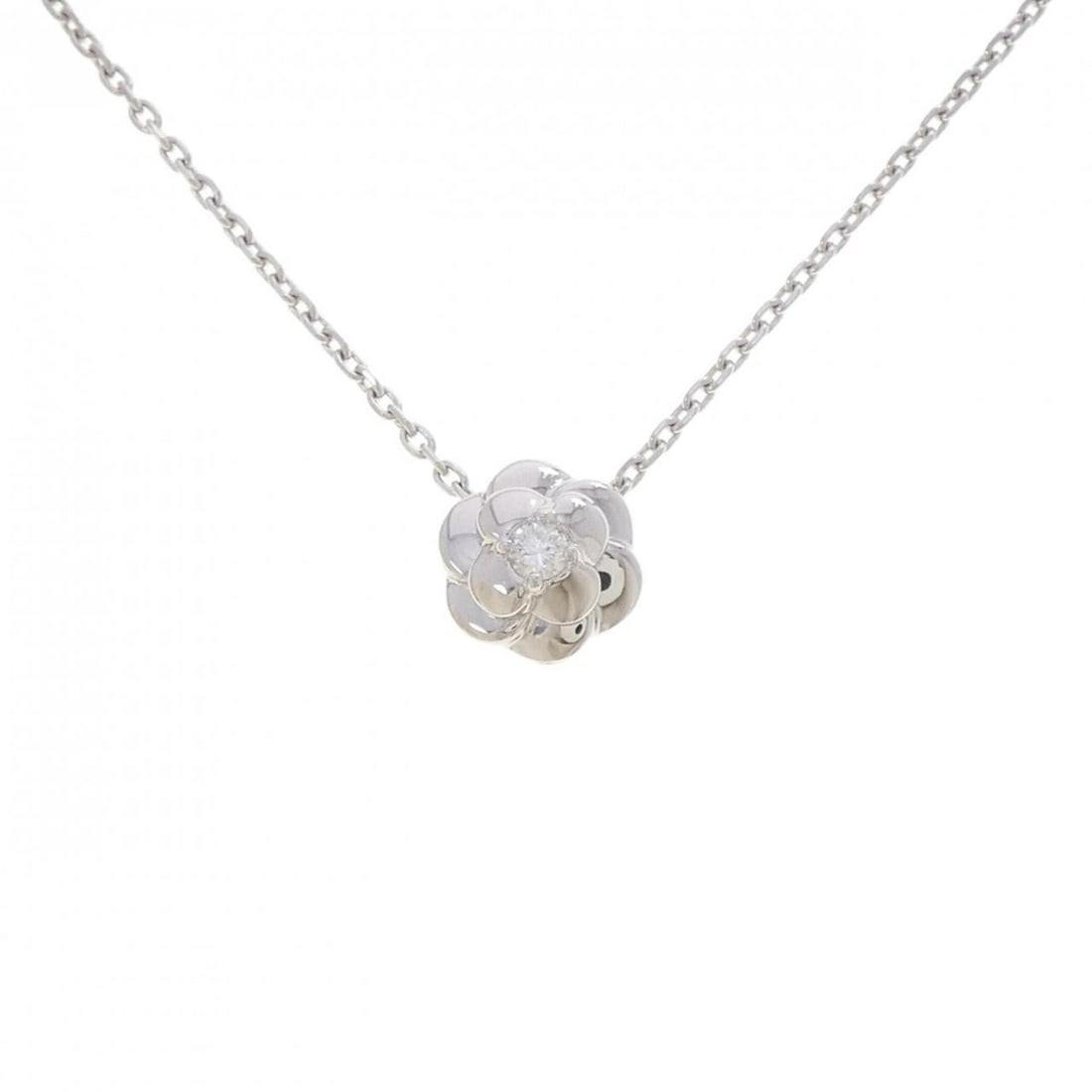 Chanel Camellia Necklace: --- Catalog ---Category: SizePendant Size: 12mm x 11.3mm / 0.47'' x 0.44''Neck Circumference: 36 cm - 40 cm / 14.17'' - 15.74''Category: DesignColor: White goldStone: DiamondGender: WomenMaterial: