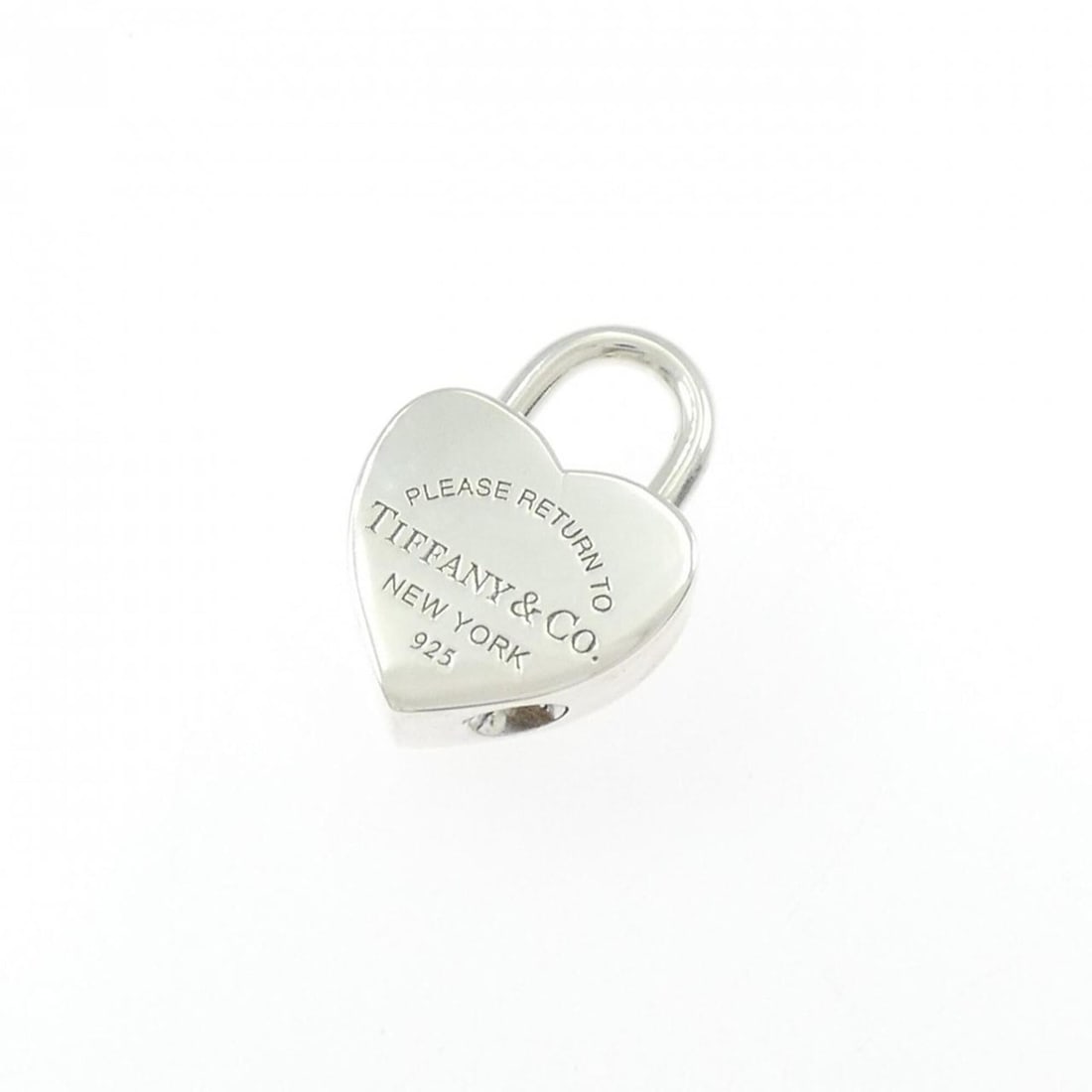 Tiffany & Co. Return to Heart Lock Pendant: --- Catalog ---Category: SizePendant Size: 21.1mm x 14.9mm / 0.83'' x 0.58''Category: DesignColor: SilverGender: WomenMaterial: Silver 925Pendant Type: PendantNecklace Type: PendantCategory: