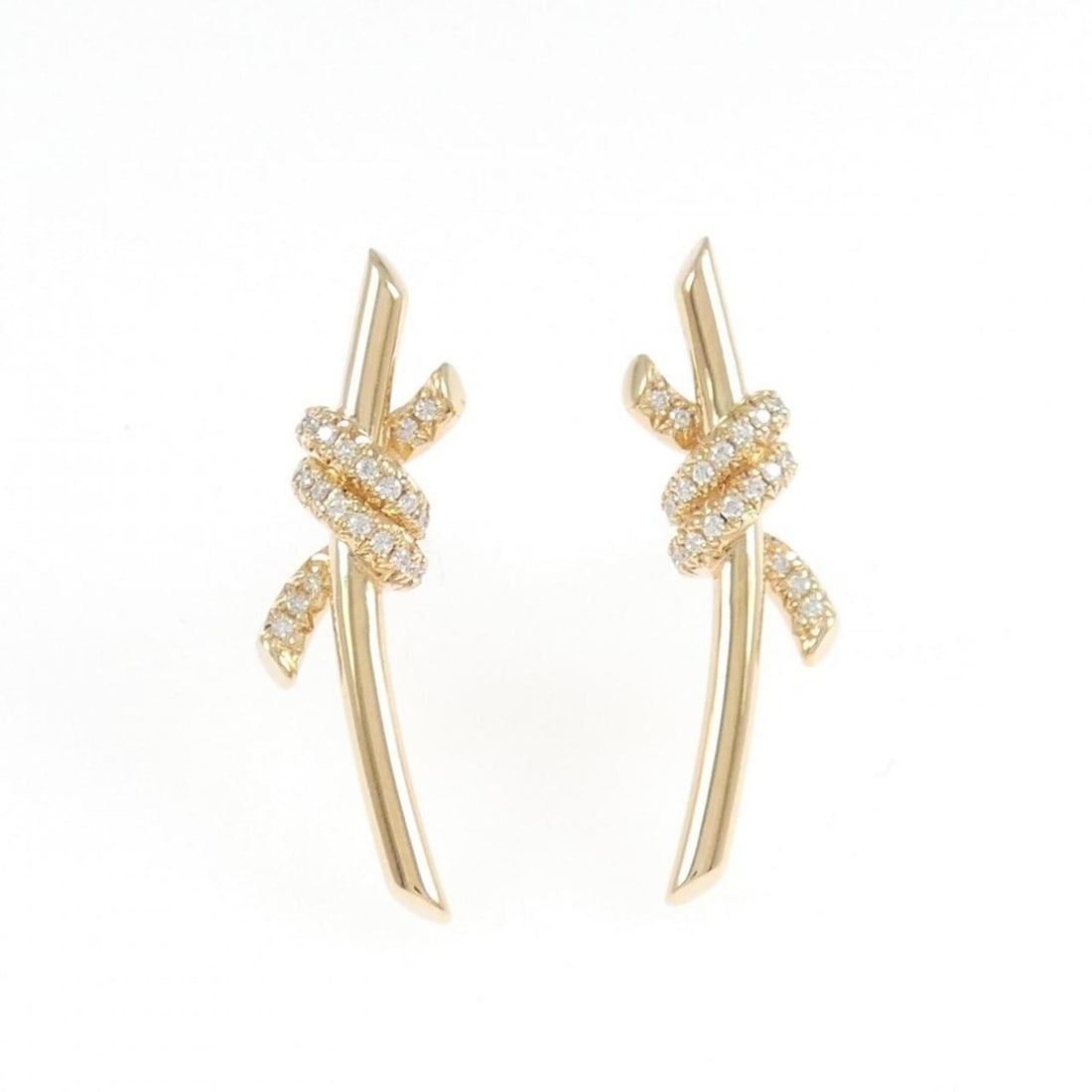Tiffany Knot Earrings: --- Catalog ---Category: SizeSize (HxWxD): 23.30mm x 6.60mm / 0.92'' x 0.26''Category: DesignType: Stud earringsGender: WomenMaterial: Pink gold (18K)Category: GeneralMPN: 69346464Brand: Tiffany---