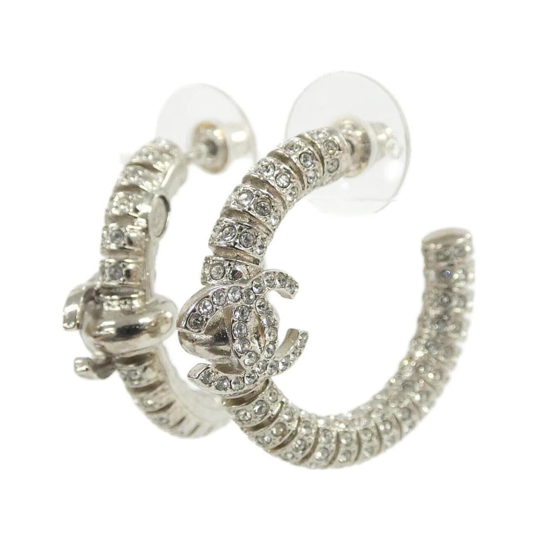 Chanel ABA320 Earrings: --- Catalog ---Category: SizeSize (HxWxD): 27.00mm x 3.00mm / 1.06'' x 0.12''Category: DesignType: Stud earringsColor: Clear, SilverGender: WomenCategory: GeneralMPN: ABA320Brand: Chanel--- Item List 
