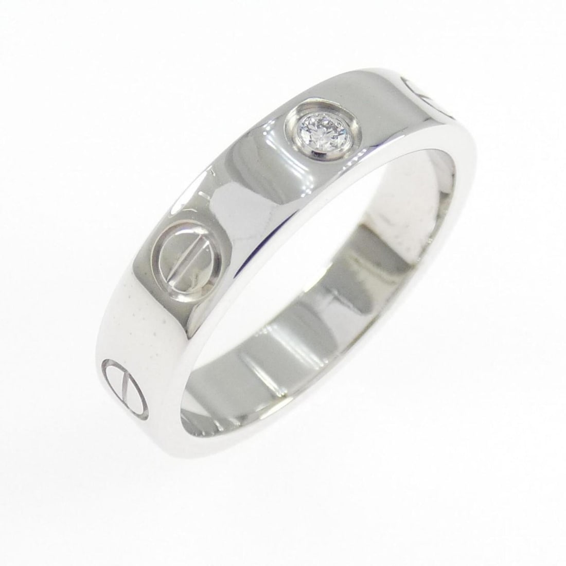 Cartier Mini Love 1P Ring: --- Catalog ---Category: SizeUS Size: 5Brand Size: 49Category: DesignType: Band ringStone: DiamondGender: WomenMaterial: White gold (18K)Category: GeneralMPN: B4050500Brand: Cartier--- Item List
