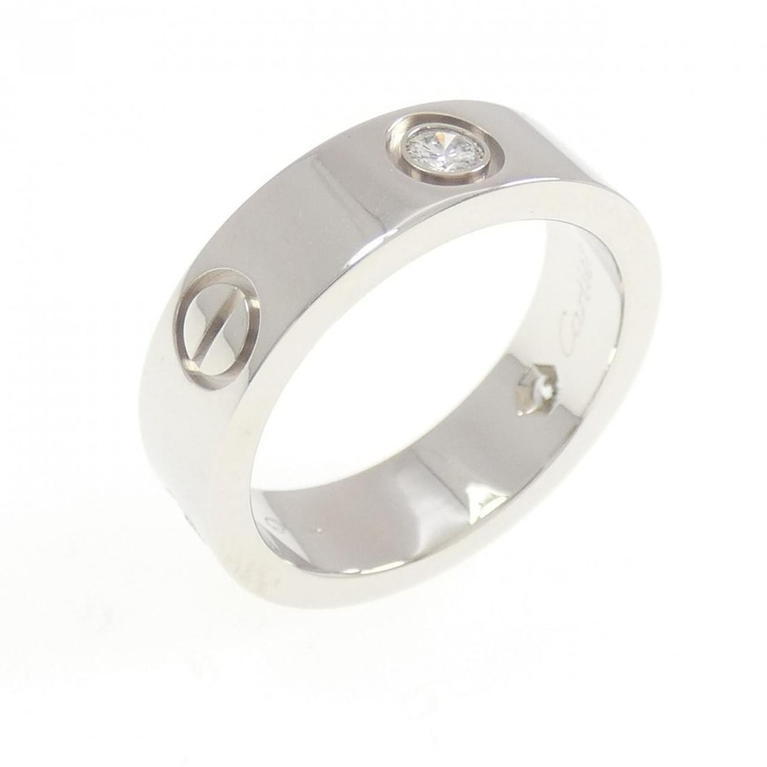 Cartier Love Half-Diamond Ring: --- Catalog ---Category: SizeUS Size: 6.5Brand Size: 52Category: DesignType: Band ringStone: DiamondGender: WomenMaterial: White gold (18K)Category: GeneralMPN: B4032500Brand: Cartier--- Item List