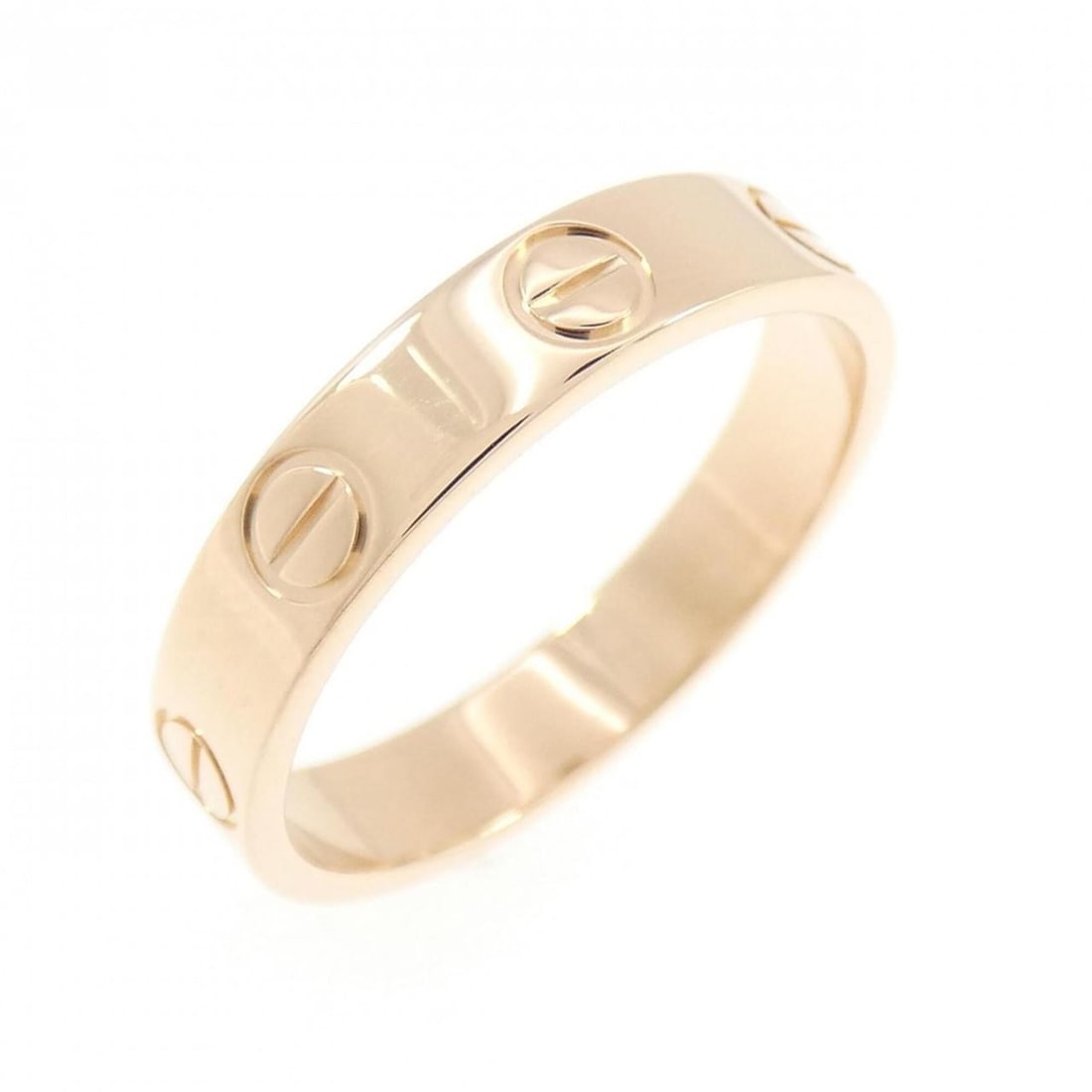 Cartier Mini Love Ring: --- Catalog ---Category: SizeUS Size: 5.5Brand Size: 50Category: DesignType: Band ringColor: Pink goldGender: WomenMaterial: Pink gold (18K)Category: GeneralBrand: Cartier--- Item List ---Section: