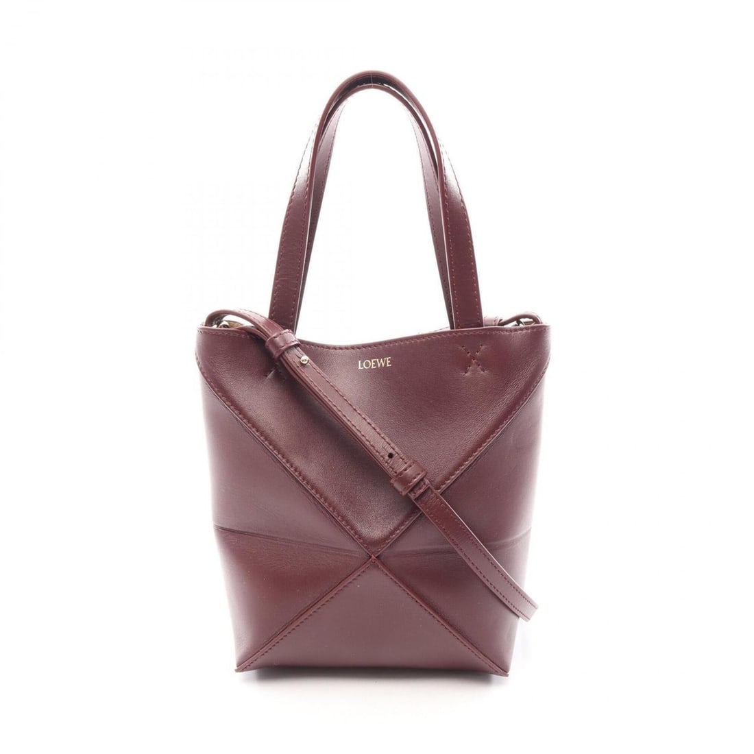 Loewe PUZZLE FOLD TOTE MINI 2-Way Leather Handbag for Women, Bordeaux Color: --- Catalog ---Category: SizeSize (HxWxD): 20cm x 16cm x 9cm / 7.87'' x 6.29'' x 3.54''Category: DesignType: Handbag, Tote bagColor: BordeauxGender: WomenMaterial: Leather Category: GeneralBrand: Loew