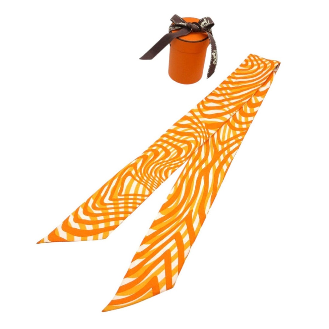 Excellent condition Hermes Twilly scarf/muffler, silk, orange, white, 0328HERMES: --- Catalog ---Category: SizeSize (LxW): 86cm x 5cm / 33.85'' x 1.96''Category: DesignType: ScarfColor: Orange, WhiteGender: WomenMaterial: Silk Category: GeneralBrand: HermesCountry of Origin: France