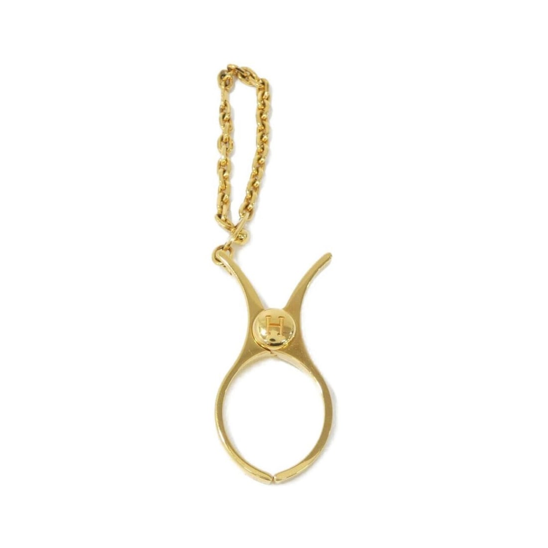 Hermes Philou Glove Holder 000833G: --- Catalog ---Category: DesignType: OthersColor: GoldGender: Women,MenCategory: GeneralMPN: 000833GBrand: Hermes--- Item List ---Section: ConditionRanking: Rank A Used - A few traces of usage, some