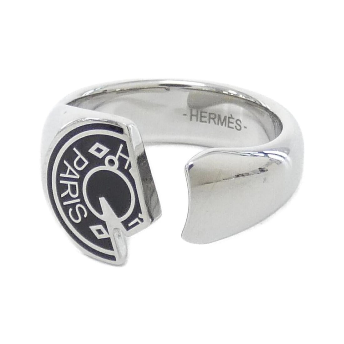 Hermes Carousel 077326FJ Ring: --- Catalog ---Category: SizeJP Size: 21US Size: 10Category: DesignType: Band ringColor: Black, SilverGender: MenMaterial: PalladiumCategory: GeneralMPN: 077326FJBrand: Hermes--- Item List