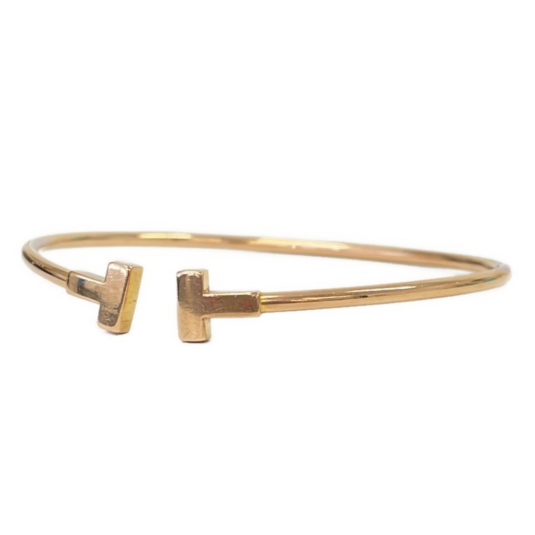 Tiffany & Co. 750 18K T Narrow Wire Bracelet, Gold, Women's: --- Catalog ---Category: SizeLength: 15cm / 5.9''Category: DesignType: BangleColor: GoldGender: WomenMaterial: Gold (18K)Category: GeneralBrand: Tiffany--- Item List ---Section: ConditionRanking: Rank