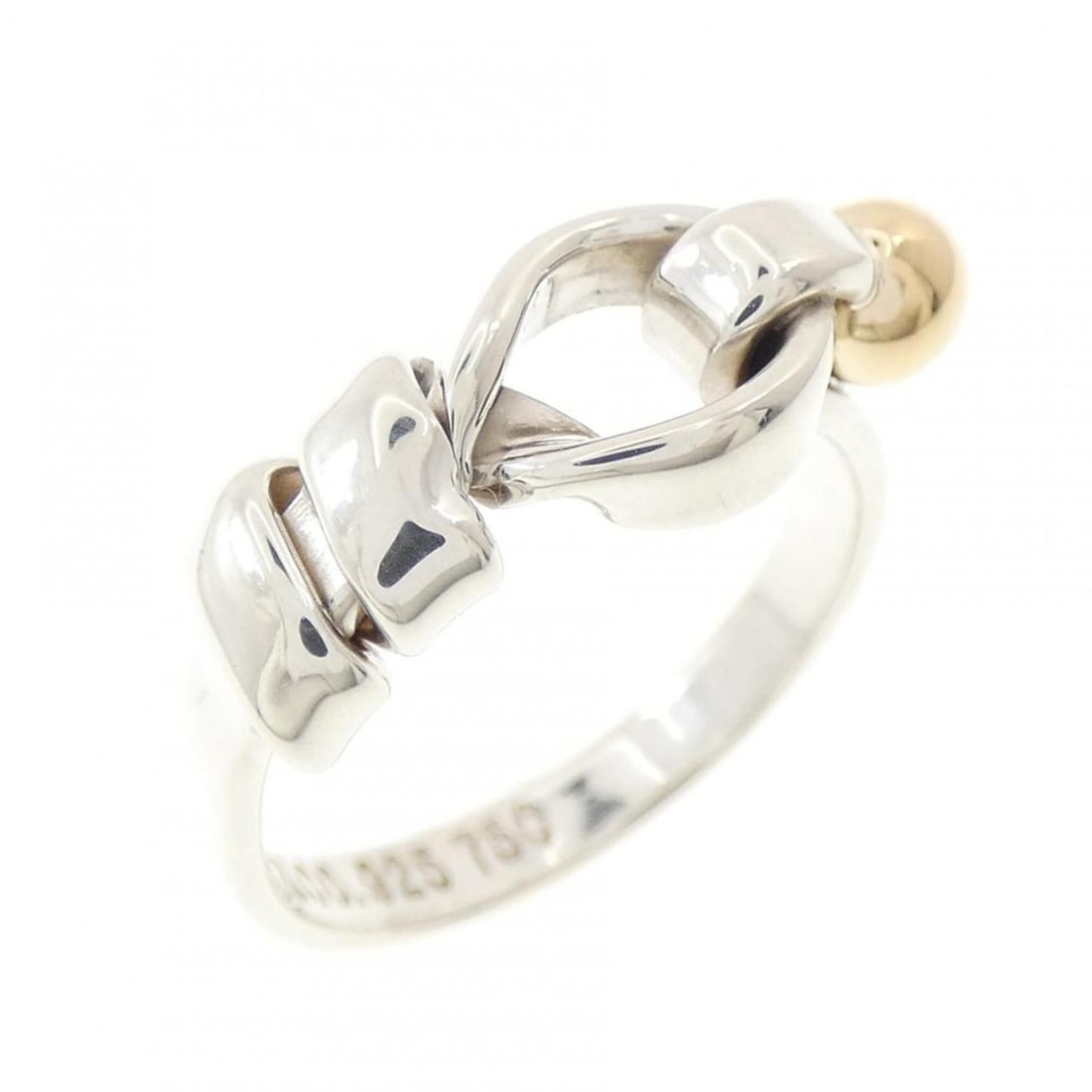 Tiffany & Co. Flat Wire Love Knot Ring: --- Catalog ---Category: SizeJP Size: 7.5US Size: 4Category: DesignType: Band ringGender: WomenMaterial: Silver 925, Yellow gold (18K)Category: GeneralBrand: Tiffany--- Item List ---Section: