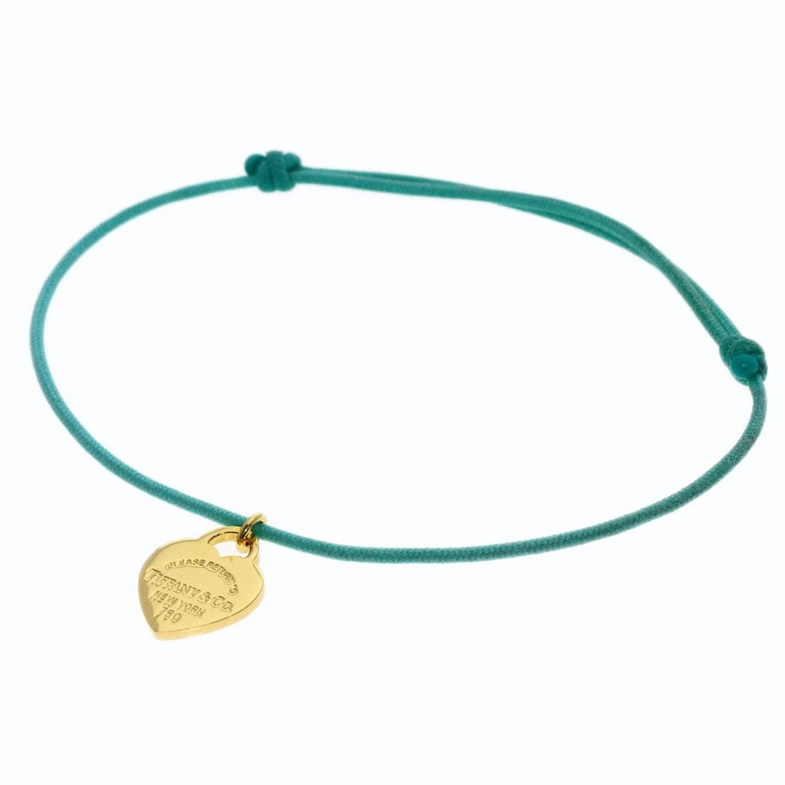 Tiffany & Co. Return to Heart Tag Blue Cord Bracelet 18K Yellow Gold Women's TIFFANY&Co.: --- Catalog ---Category: SizeLength: 21cm / 8.26''Category: DesignType: Charm braceletGender: WomenMaterial: Yellow gold (18K)Category: GeneralBrand: Tiffany--- Item List ---Section: ConditionRanking: