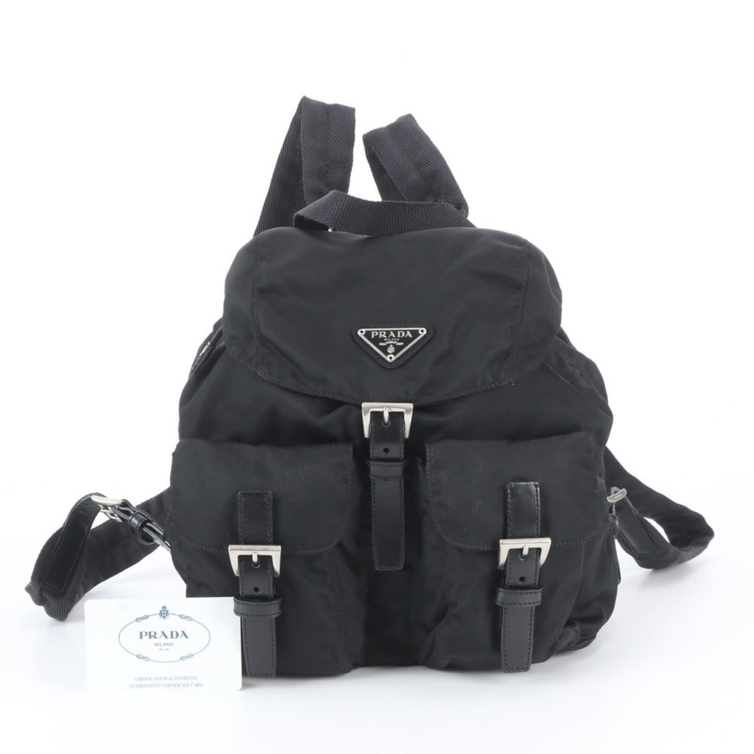 Prada Tessuto Nylon Triangle Logo Backpack (B6677) for Women, with Guarantee Card.: --- Catalog ---Category: SizeSize (HxWxD): 20cm x 24cm x 11cm / 7.87'' x 9.44'' x 4.33''Category: DesignType: BackpackColor: BlackGender: WomenMaterial: Nylon , Leather Category: GeneralBrand: PradaCo