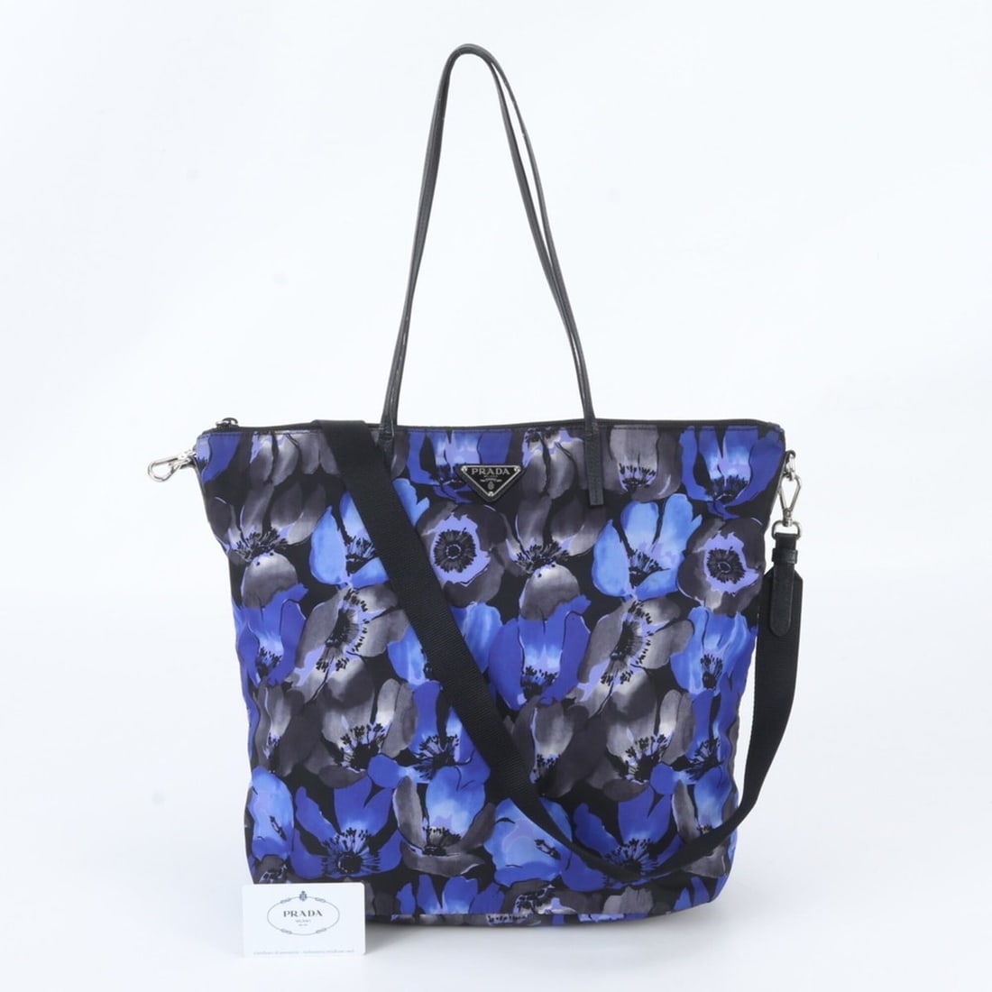 Prada Guarantee Card Tessuto Nylon Triangle Logo 1BG189 Leather 2-Way Shoulder Bag Tote for Women: --- Catalog ---Category: SizeSize (HxWxD): 30cm x 32cm x 14cm / 11.81'' x 12.59'' x 5.51''Category: DesignType: Shoulder bag, Tote bagColor: Black, BlueGender: WomenMaterial: Nylon , Leather Category: