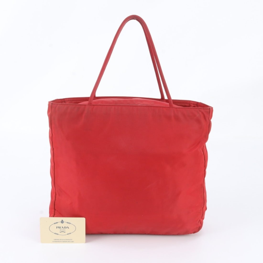 Prada Tessuto Nylon Handbag/Tote Bag with Guarantee Card, B8489, Women's.: --- Catalog ---Category: SizeSize (HxWxD): 25cm x 29cm x 9cm / 9.84'' x 11.41'' x 3.54''Category: DesignType: Handbag, Tote bagColor: Red colorGender: WomenCategory: GeneralBrand: PradaCountry of Orig