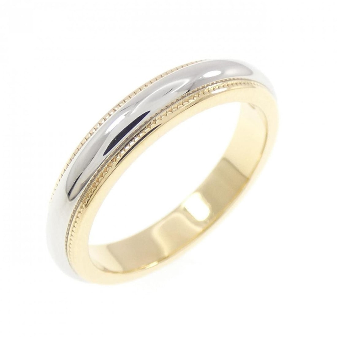 Tiffany & Co. Milgrain Ring: --- Catalog ---Category: SizeJP Size: 9US Size: 5Category: DesignType: Band ringGender: WomenMaterial: Platinum 950, Yellow gold (18K)Category: GeneralBrand: Tiffany--- Item List ---Section: