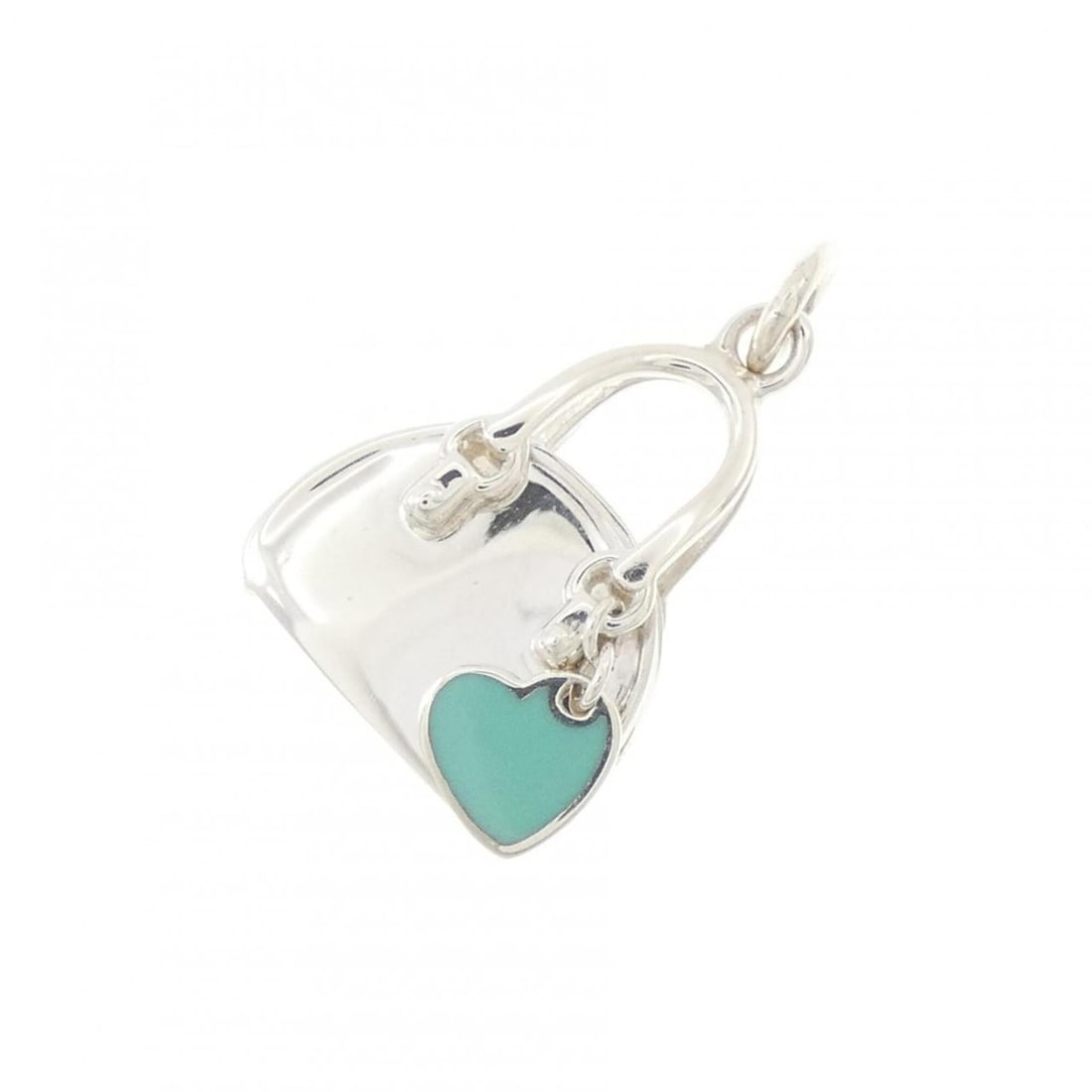 Tiffany handbag pendant: --- Catalog ---Category: SizePendant Size: 25.5mm x 14.5mm / 1'' x 0.57''Category: DesignGender: WomenMaterial: Silver 925Necklace Type: PendantCategory: GeneralBrand: Tiffany--- Item List ---Section: