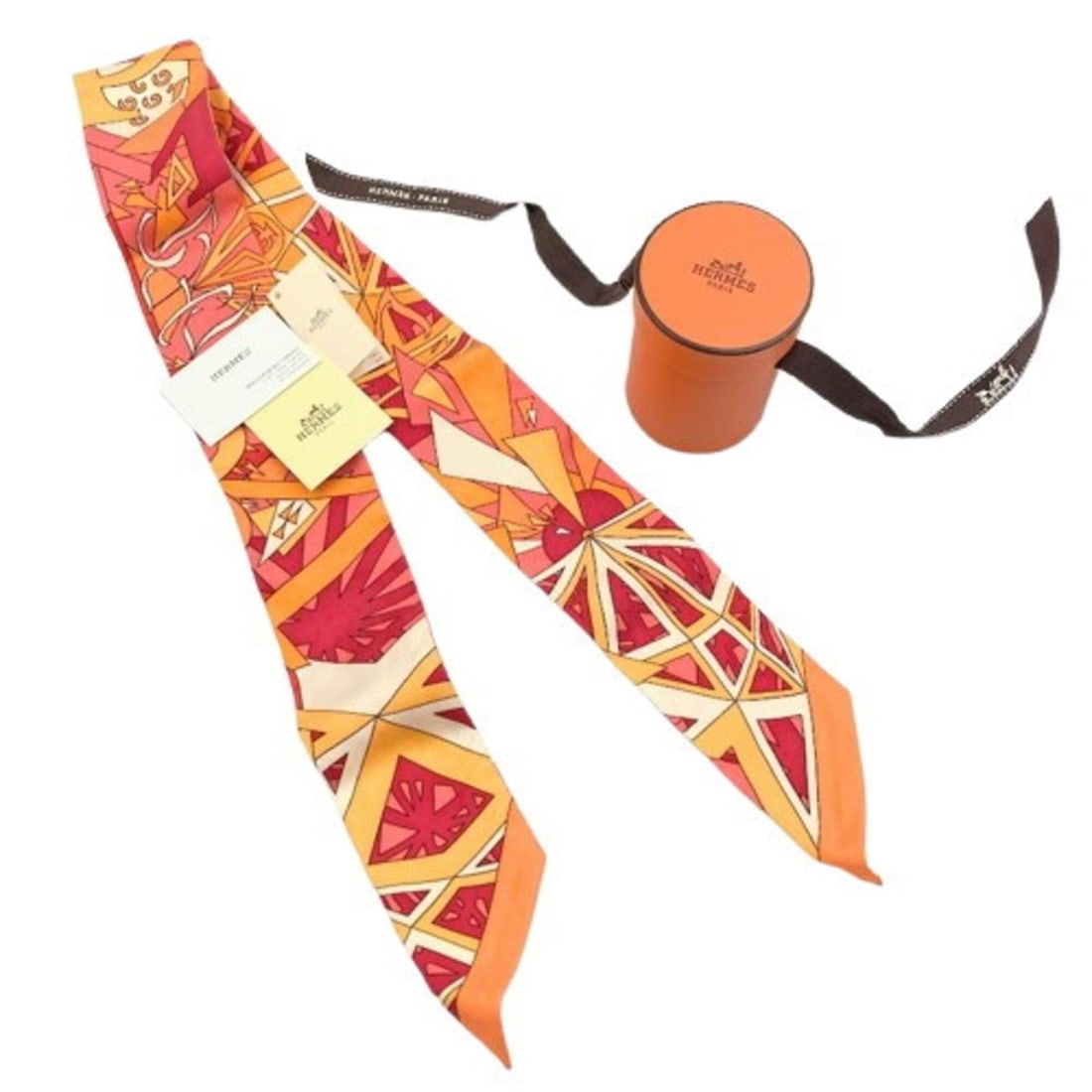 HERMES Twilly scarf/muffler in orange color (some threads are coming loose).: --- Catalog ---Category: SizeSize (LxW): 86cm / 33.85''Category: DesignType: ScarfColor: OrangeGender: WomenMaterial: Silk Category: GeneralBrand: Hermes--- Item List ---Section: ConditionRanking: Ran