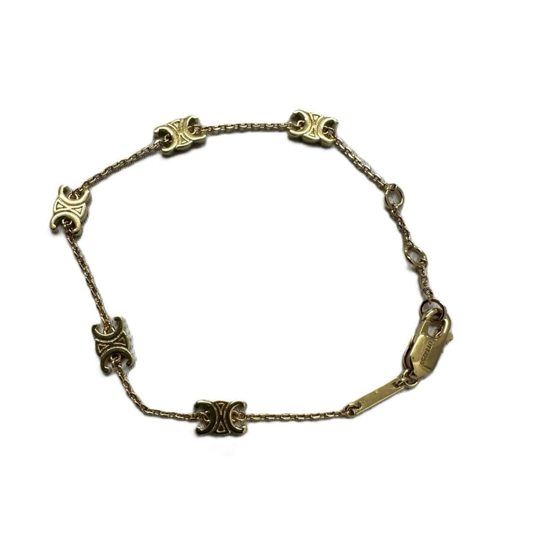 CELINE Triomphe Bracelet, Gold-colored Chain Bracelet for Women: --- Catalog ---Category: SizeTotal Length: 17cm / 6.69''Category: DesignType: Charm braceletGender: WomenCategory: GeneralBrand: Celine--- Item List ---Section: ConditionRanking: Rank NS Never used / 