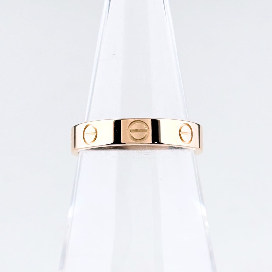 Cartier Mini Love Ring, Pink Gold (PG), 750, Women's Ring: --- Catalog ---Category: SizeUS Size: 6.5Brand Size: 52Category: DesignType: Band ringGender: WomenMaterial: Pink gold (18K)Category: GeneralBrand: Cartier--- Item List ---Section: ConditionRanking: R