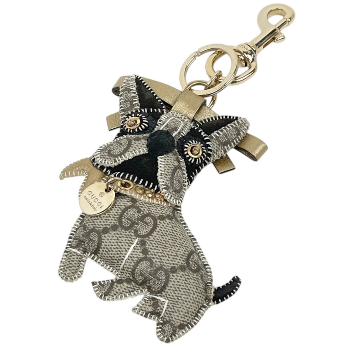 Gucci keychain, bulldog motif, GG pattern, coated canvas and leather, brown, women's.: --- Catalog ---Category: SizeSize (HxWxD): 17cm x 7.5cm / 6.69'' x 2.95''Category: DesignType: KeyringColor: BrownGender: WomenMaterial: Canvas, LeatherCategory: GeneralBrand: Gucci--- Item List ---Se