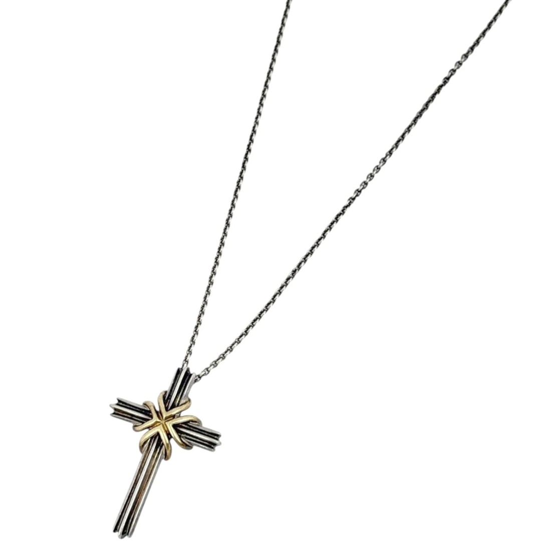 Tiffany & Co. Signature Cross Necklace, 18K Gold and Sterling Silver 925/750, for Women: --- Catalog ---Category: SizePendant Size: 33mm x 22mm / 1.29'' x 0.86''Neck Circumference: 61.8 cm / 24.33''Category: DesignColor: Gold, SilverGender: WomenMaterial: Gold (18K), Silver 925Necklace Ty