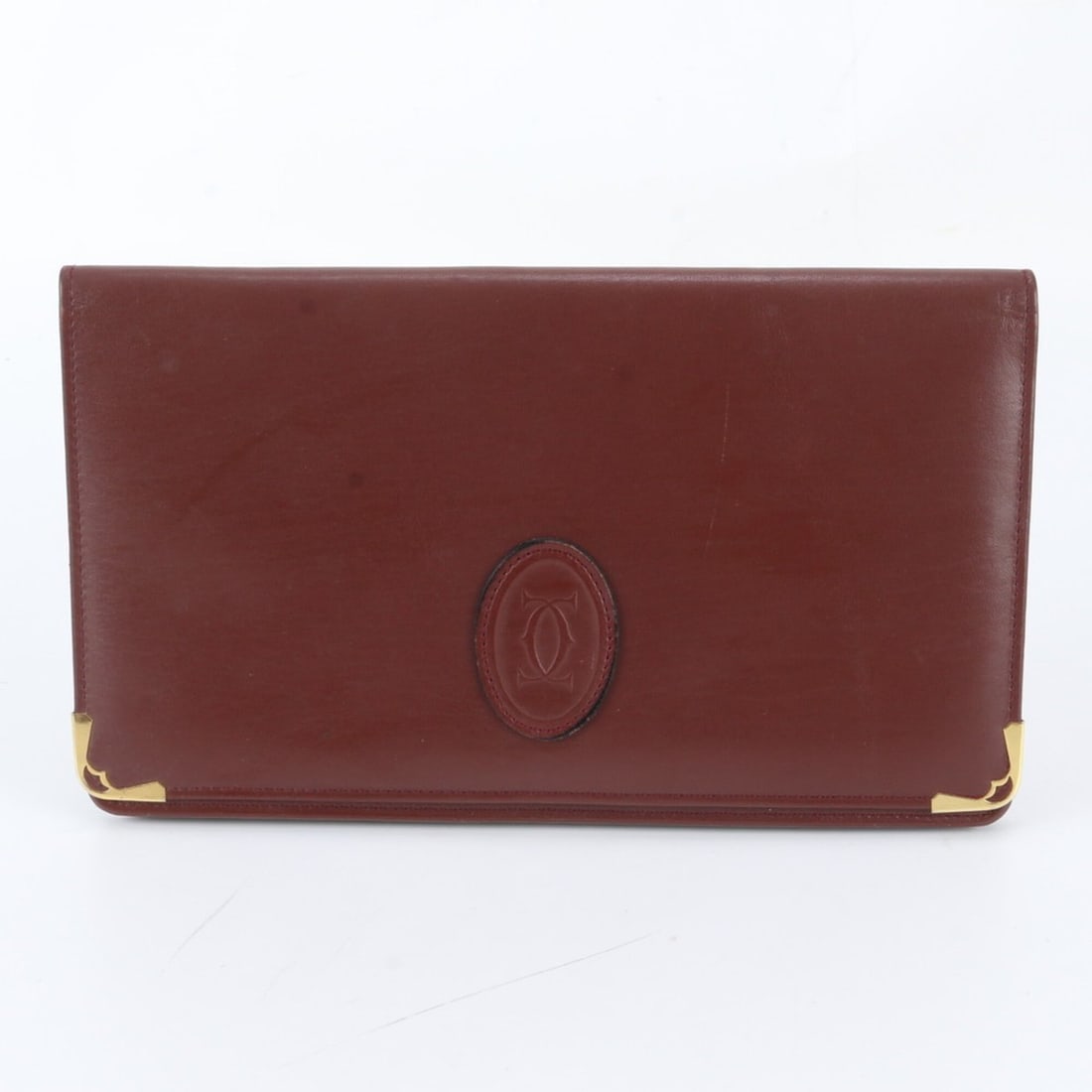 Cartier Must Line Leather Second Bag Clutch Pouch Business for Men: --- Catalog ---Category: SizeSize (HxWxD): 17cm x 28cm x 2cm / 6.69'' x 11.02'' x 0.78''Category: DesignType: Clutch bag, PouchColor: Wine redGender: MenMaterial: Leather Category: GeneralBrand: Carti
