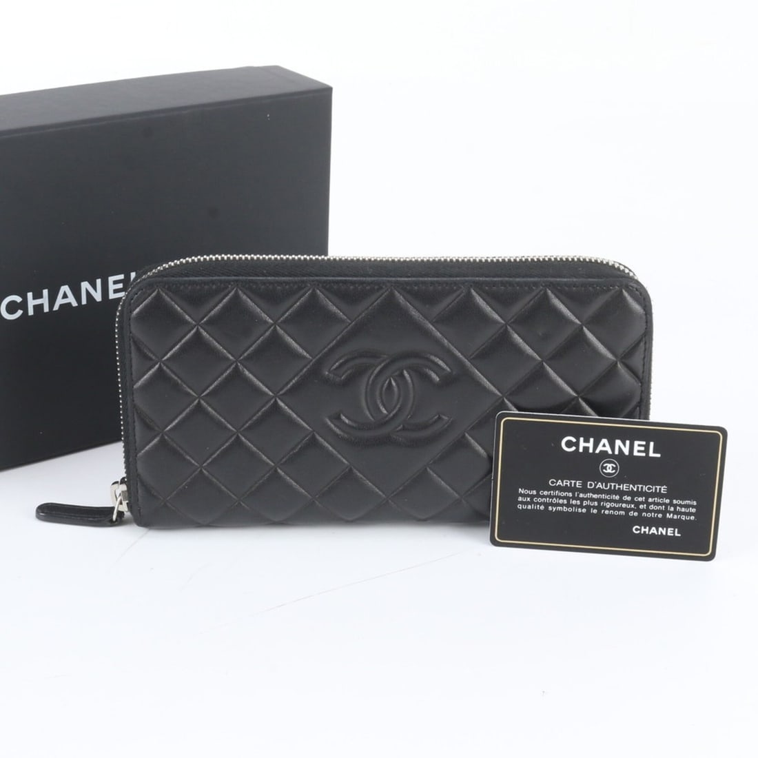 Chanel Matelassé Lambskin Leather Long Wallet with Guarantee Card and Serial Number (Women's): --- Catalog ---Category: SizeSize (HxWxD): 10cm x 20cm x 2cm / 3.93'' x 7.87'' x 0.78''Category: DesignType: Long wallet (bi-fold)Color: BlackGender: WomenMaterial: Leather Leather/Fur Type: LambskinC