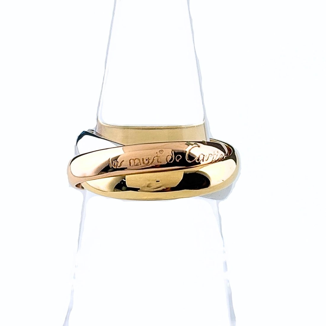 Cartier Trinity ring in yellow gold (YG), pink (PG), and white (WG). Three-color design. 750 gold.